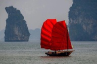 Red-sailed boats turn heads on Ha Long Bay