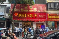 Hanoi residents queue to buy silver as prices soar to record highs