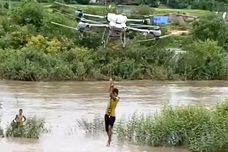 Drone used to rescue two children trapped in floodwaters in Gia Lai