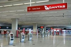 Qantas posts huge loss, says no international flights until October