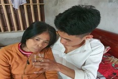 Young man taking care of ailing mother in dire need of help