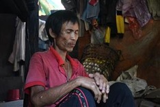 Vietnamese jungle man struggles with cancer