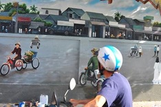 Mural project brightens Can Tho street