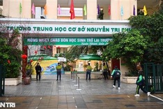 Hanoi students return to school after online study exile