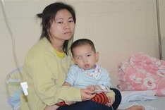 Young mother struggles to help son battle cancer