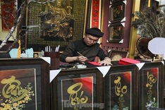 Tet calligraphy street opens in HCM City