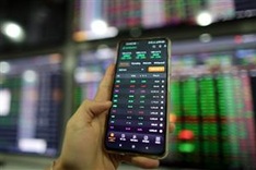 Asian markets surge on Fed rate hopes