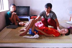 Poor couple seeks help for three ailing children