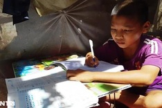 Poor boy takes care of ailing mother