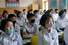 Testing time: South Korean students take exam with virus precautions