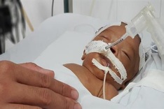 Ill and abandoned infant receives help from readers