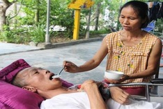 Ill wife struggles to take care of bed-bound husband and small children