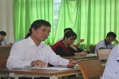 Mature students participate in high school graduation exams