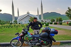 Tien Giang man travels the world by motorbike