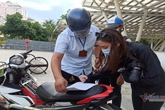 HCM City residents fined for not wearing face masks