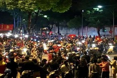 Football fans hit Hanoi streets after victory over UAE