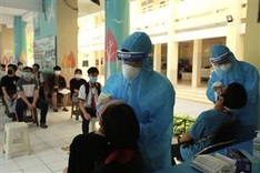 Ho Chi Minh City students get Covid-19 tests before national exams