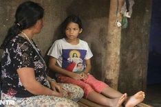 Ethnic minority girl struggling with cirrhosis in need of support