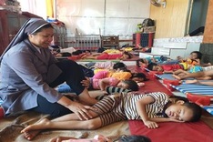 Nun takes care of hundreds of orphanage children