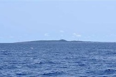 Fourteen crewmembers await rescue after fishing boat sinks