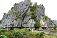 Crocodile-shaped cave in limestone mount