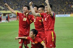 Crowds jam traffic in Hanoi and HCMC to cheer Vietnam win in Malaysia