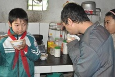 Orphan boy taking care of brother and sister with mental illness