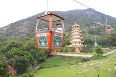 Scaling Ba Den Mountain by cable car