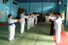 Aikido female master of disabled kids