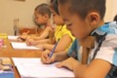 5-year-old children hurrying for intensive practice writing classes