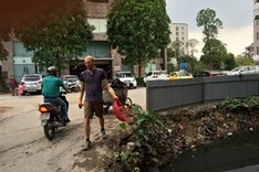 Foreigners help keep Hanoi clean