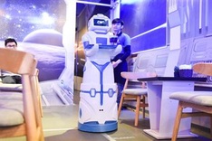 Made-in-Vietnam robot used in Hanoi coffee shop
