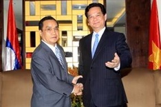 PM Dung meets with Lao counterpart