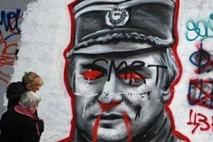 Mladic team wants judge replaced, trial postponed