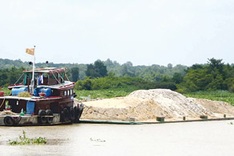 Illegal sand mining erodes riverbanks