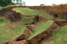 Dyke slide threatens thousands