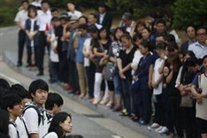 Daughter of South Korea ferry crewman kills herself