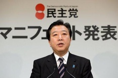 Japan approves $10.7 billion stimulus package