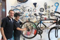 Foreign man repairs bicycles in Hanoi