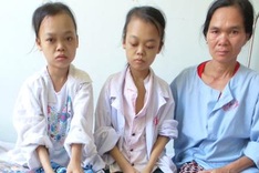 Mother suffers with children