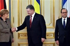 Merkel, Hollande bring peace plan to Kiev, Moscow