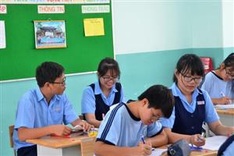 HCM City proposes ending fees for secondary students