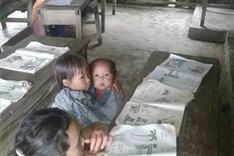 Struggling pupils take care of siblings in class