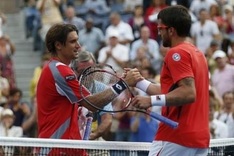 Ferrer reaches semis after thriller