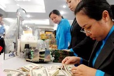 SBV lowers ceiling rates on VND and USD