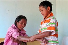Poor little boy has to take care of ailing mother