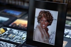 Whitney Houston 'drowned in bath after taking cocaine'