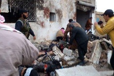 Air strike 'kills 60' as peace envoy Brahimi in Syria