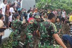 Six killed, 18 missing in Indonesian landslide