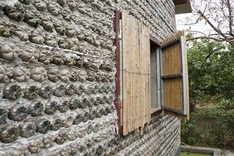 Plastic bottle house promotes environment protection